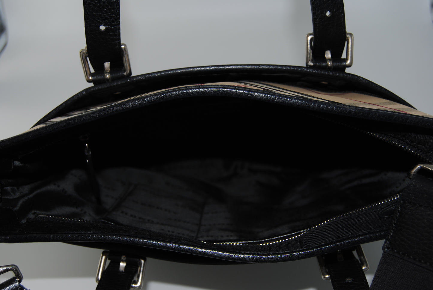 Burberry Leather and coated Canvas