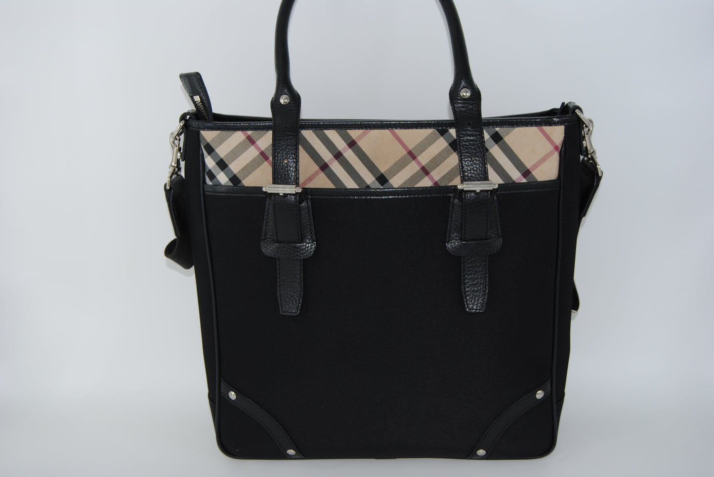 Burberry Leather and coated Canvas