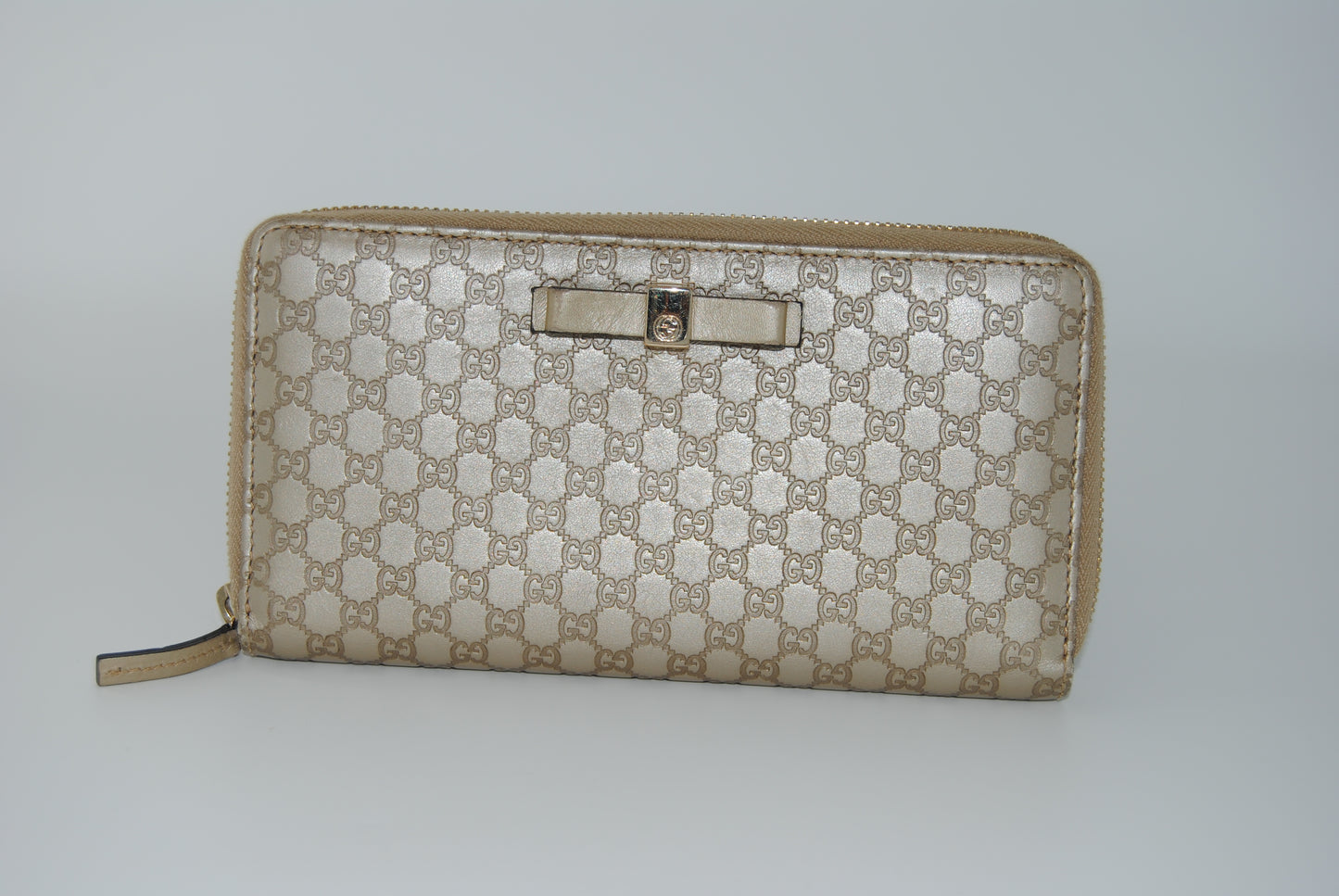Gucci Metallic Microguccissima Bow Zip Around Wallet Golden Beige