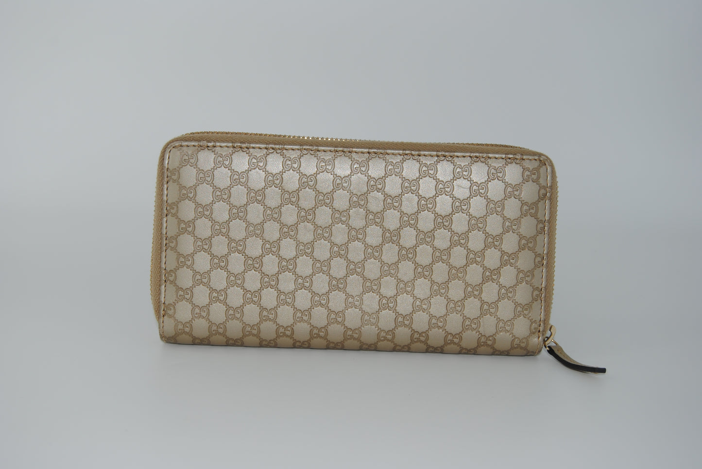 Gucci Metallic Microguccissima Bow Zip Around Wallet Golden Beige