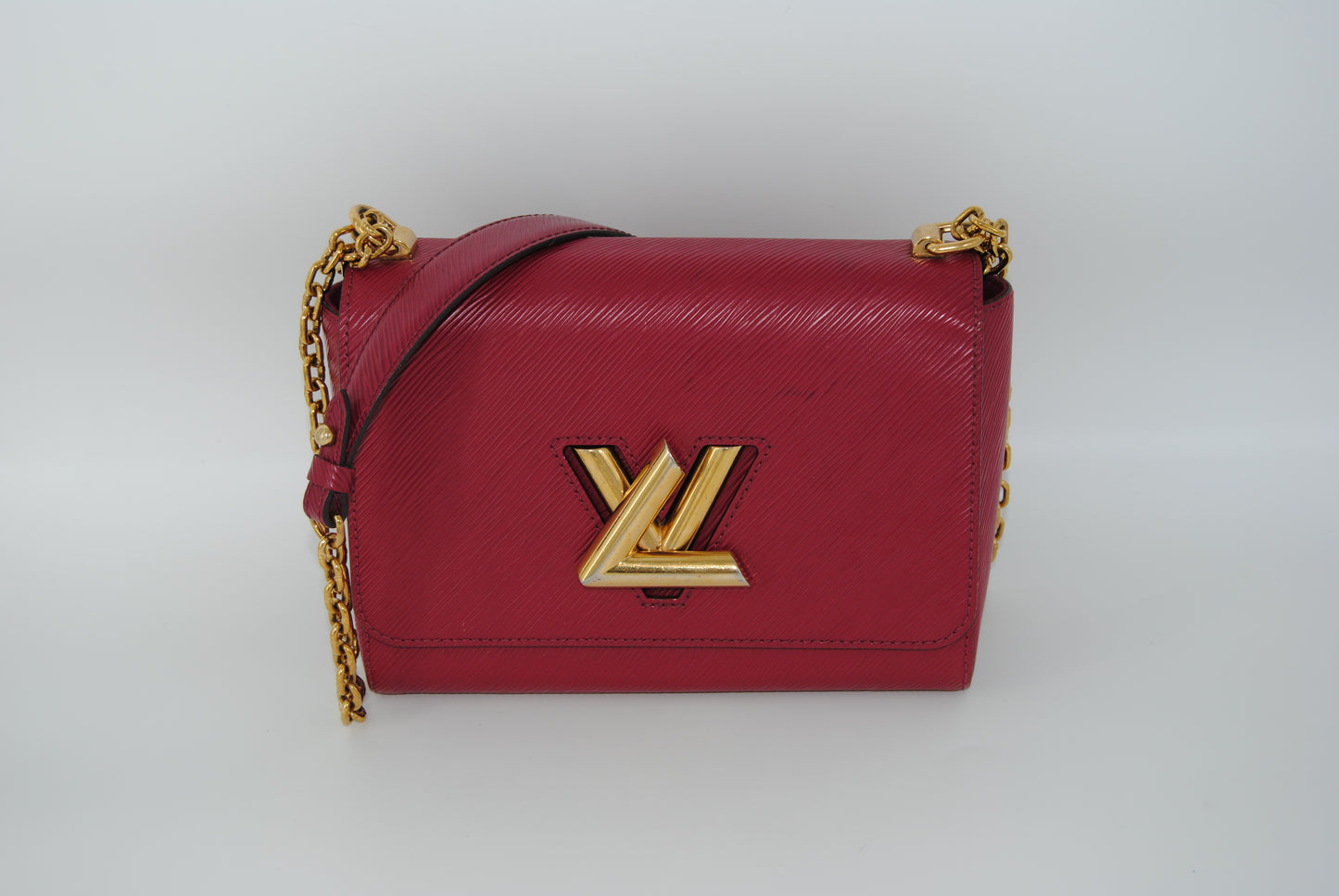 Louis Vuitton Twist Epi leather MM handbag with a gold-color