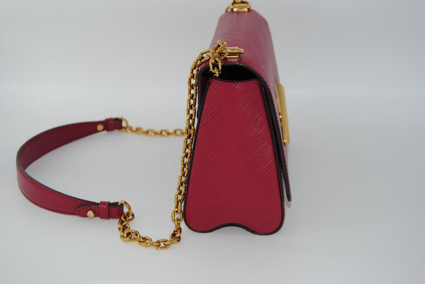 Louis Vuitton Twist Epi leather MM handbag with a gold-color