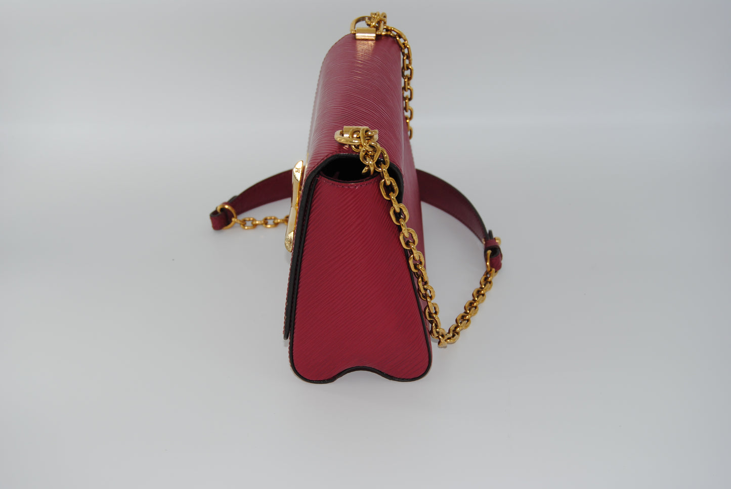 Louis Vuitton Twist Epi leather MM handbag with a gold-color