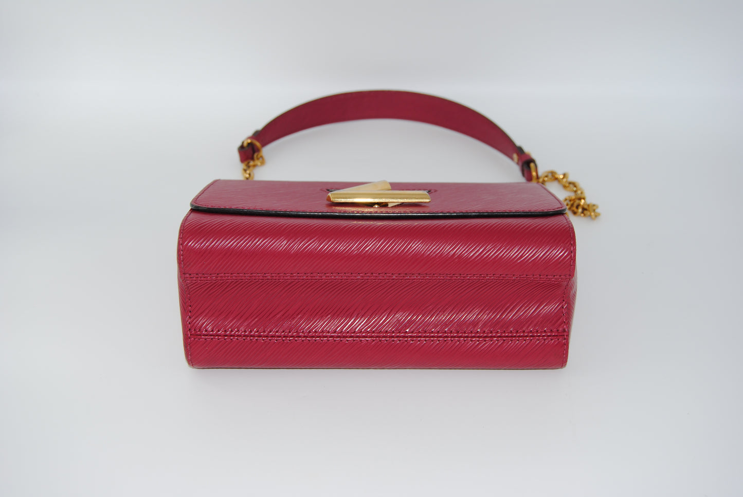 Louis Vuitton Twist Epi leather MM handbag with a gold-color