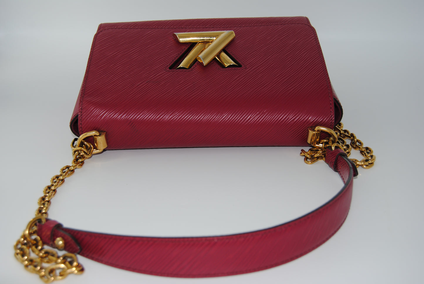 Louis Vuitton Twist Epi leather MM handbag with a gold-color