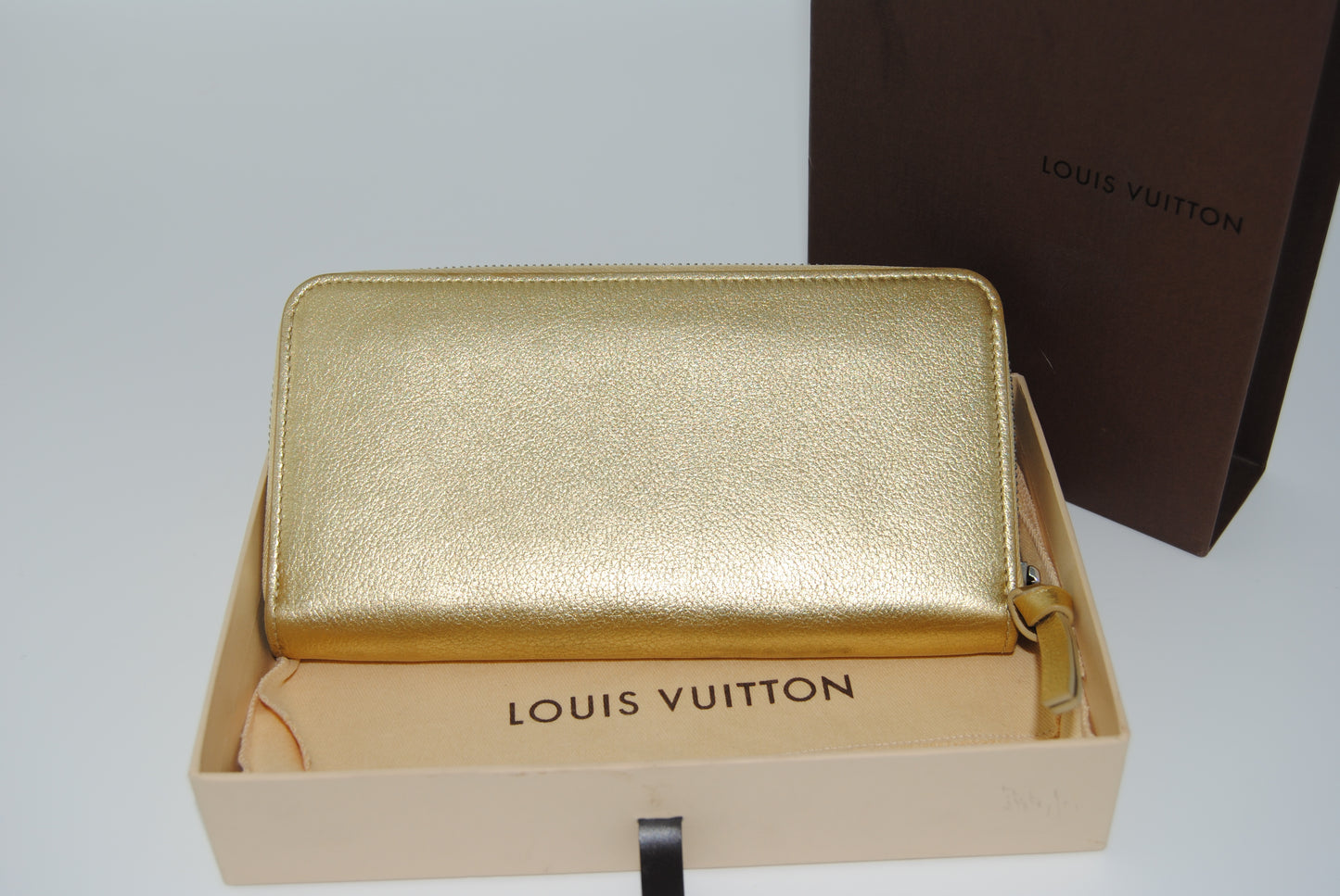 Louis Vuitton Zippy Lockme Round Long Wallet Gold