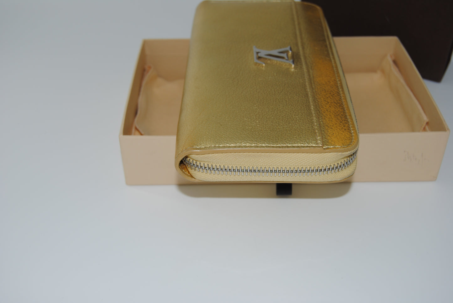 Louis Vuitton Zippy Lockme Round Long Wallet Gold