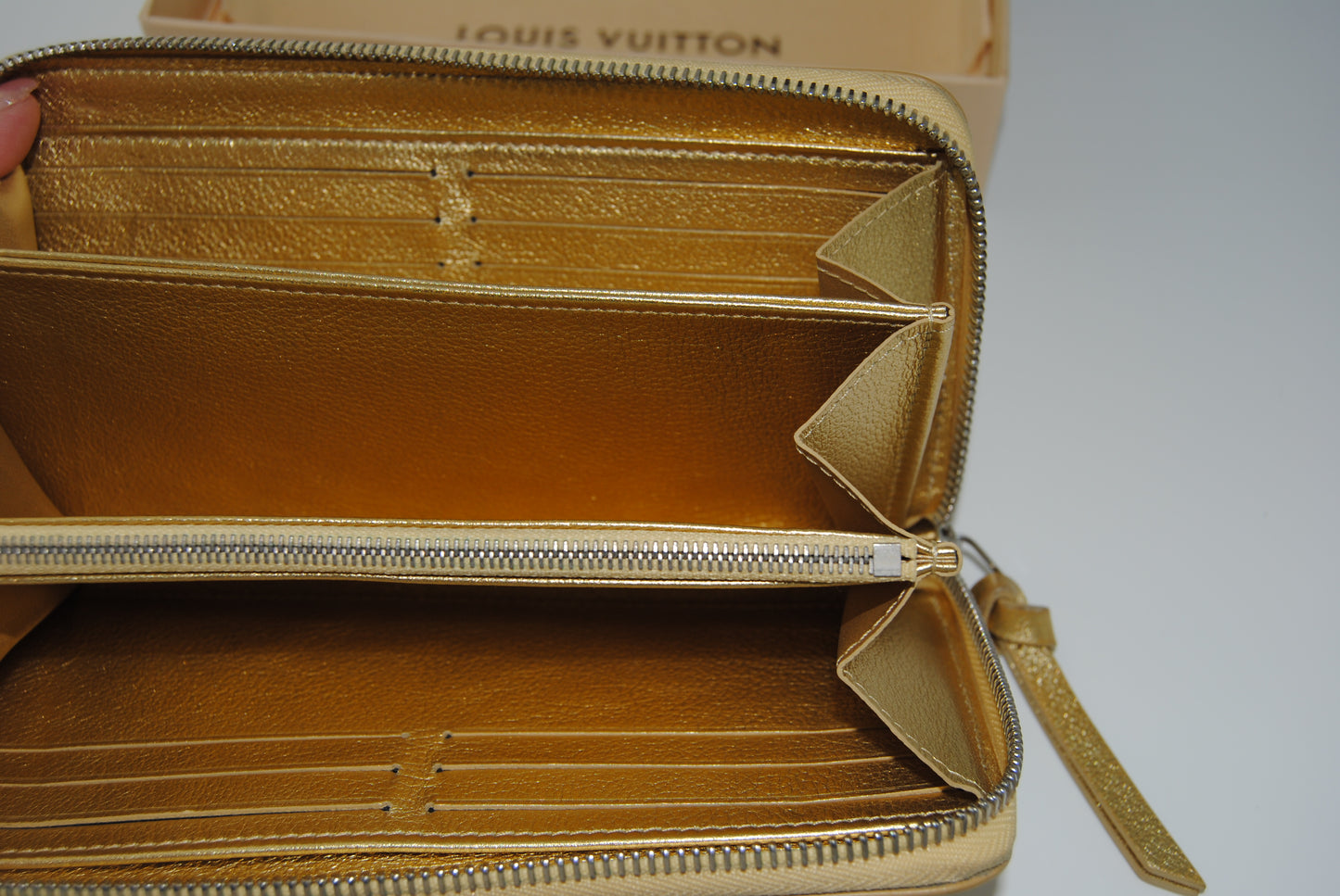 Louis Vuitton Zippy Lockme Round Long Wallet Gold