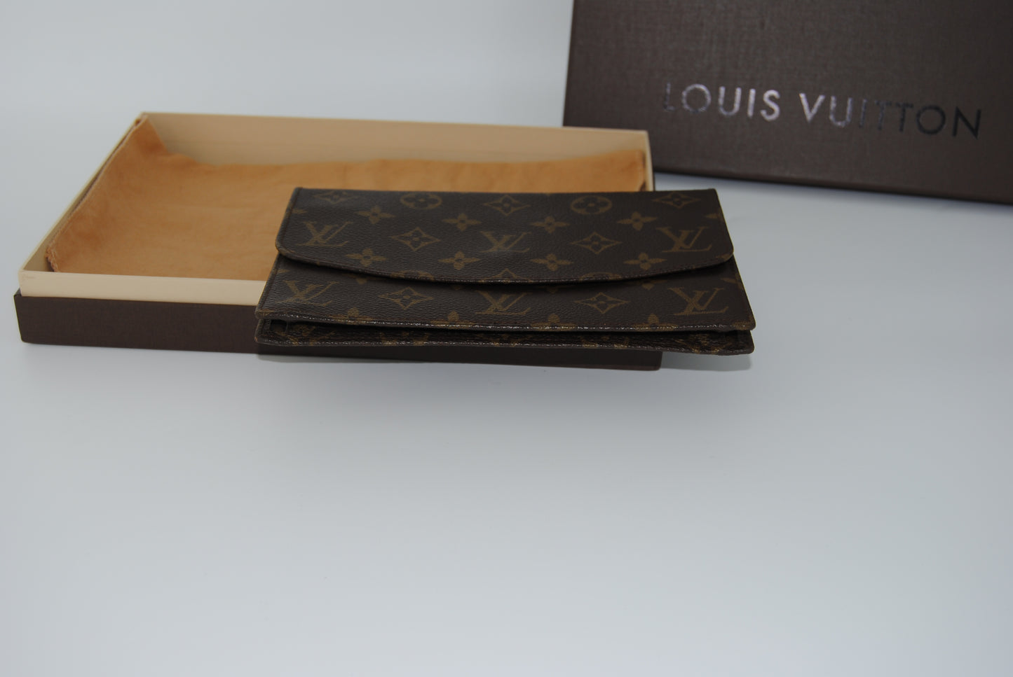 Louis Vuitton Pochette Rabat Castaño