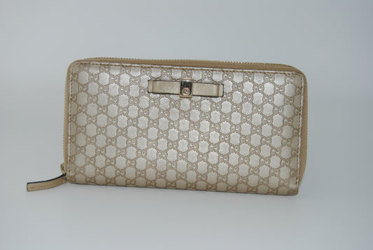 Gucci Metallic Microguccissima Bow Zip Around Wallet Golden Beige