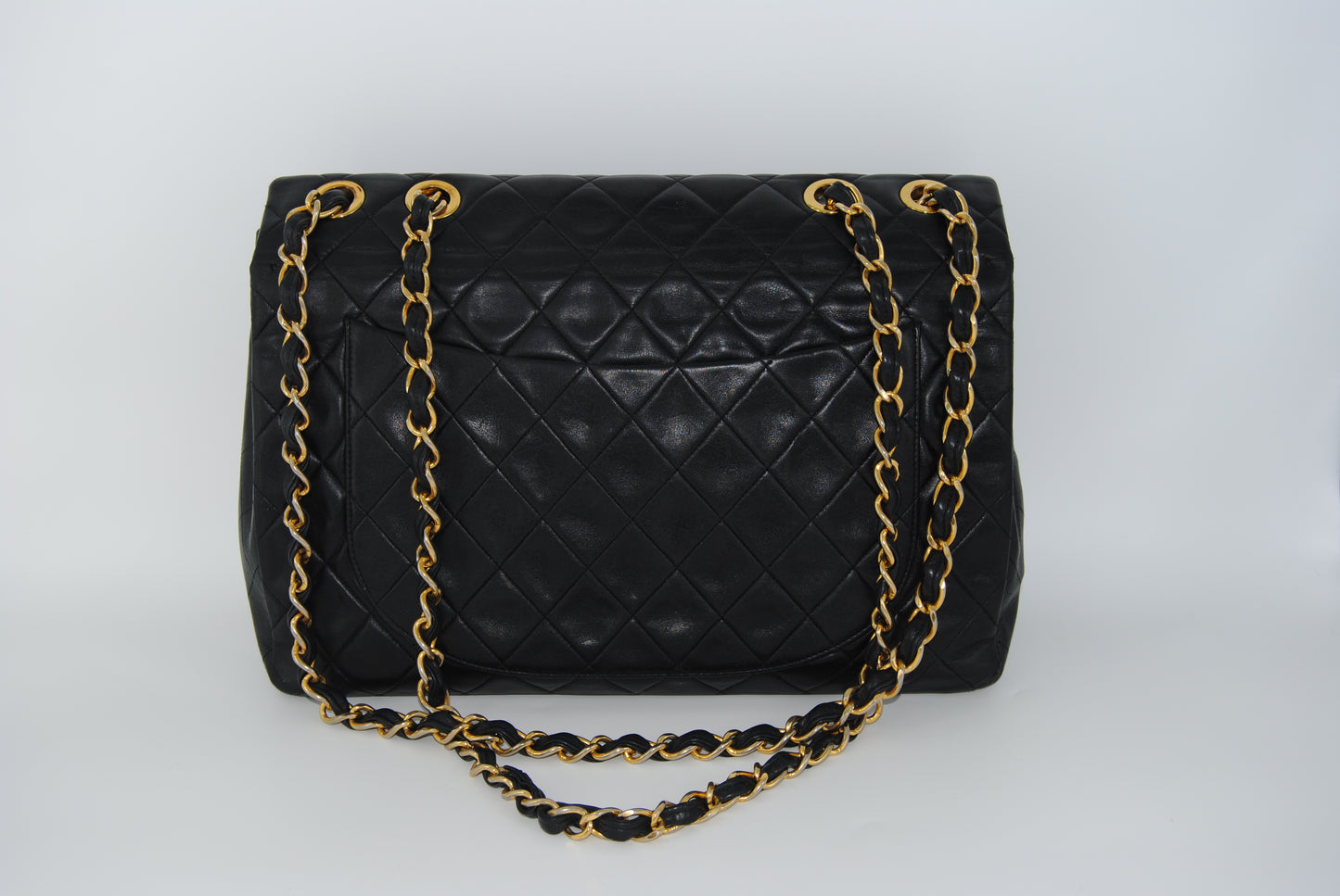 Chanel Maxi Flap in Black Matelassé Leather