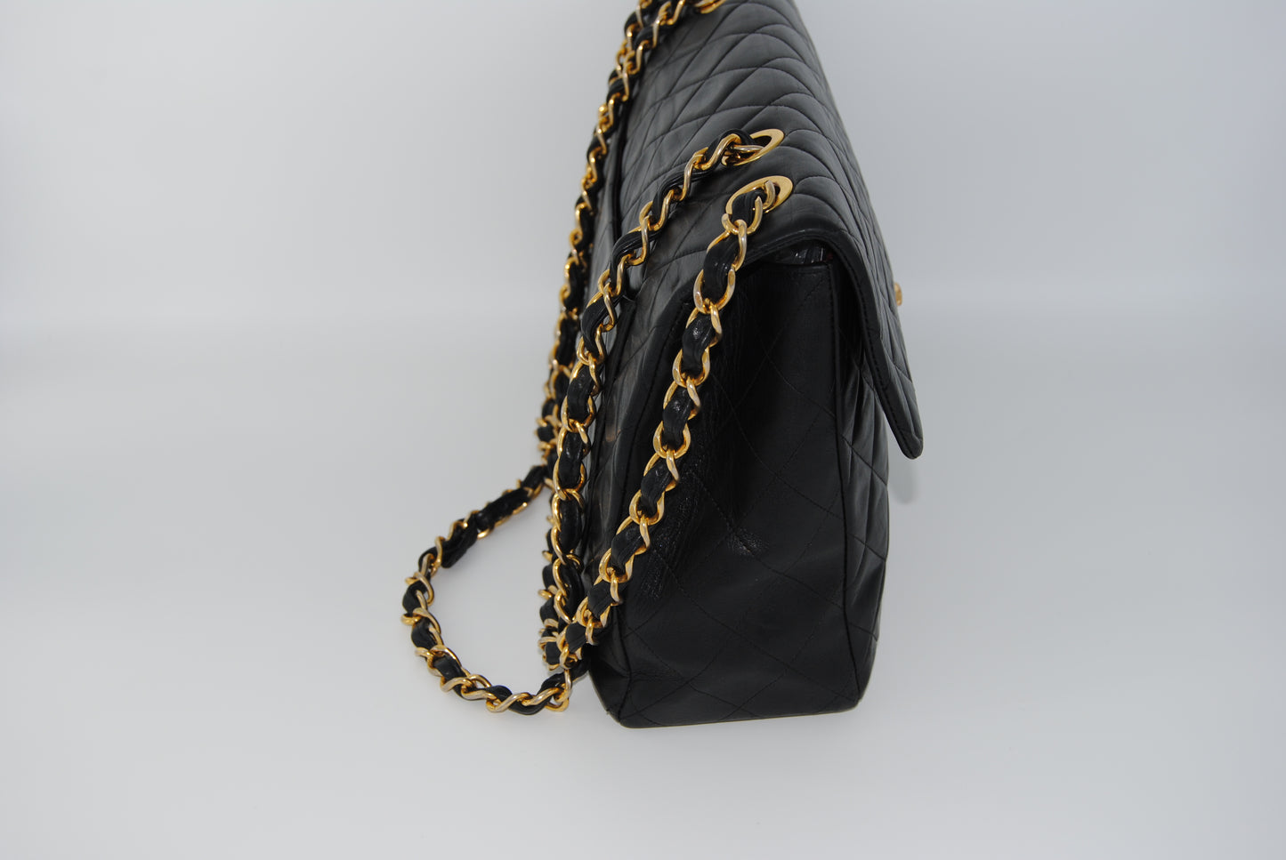 Chanel Maxi Flap in Black Matelassé Leather